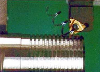 Thread cutting operation close up